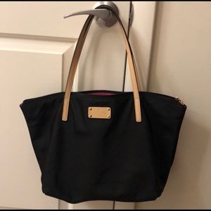 Nylon Kate spade tote. Black with pink interior.